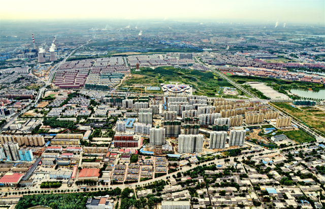 广袤大地  昔日垃圾山今日凤凰台新旧对比照片 2006年航拍