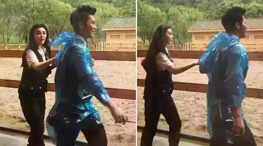 李晨男友力爆表,牵着范冰冰雨中小跑