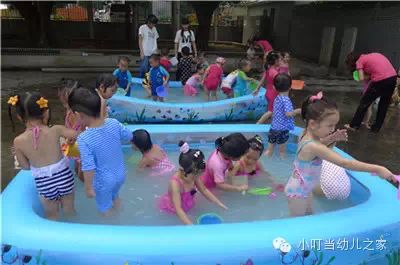 2014暑假班-玩水主题2"全园戏水日-水勺泼水"