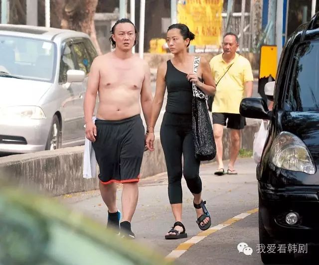 陈奕迅携妻现身街头 挺大肚腩急行只为减肥