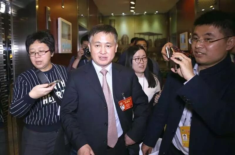 （央行副行长潘功胜，车亮摄）