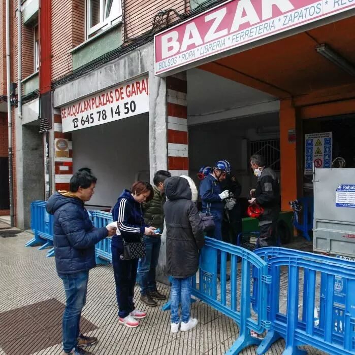 【欧浪网】华人百元店失火一年无人问津 商铺户主消失踪迹