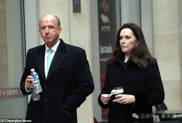 William Woodward-Fisher and wife Kerry outside London's High Court