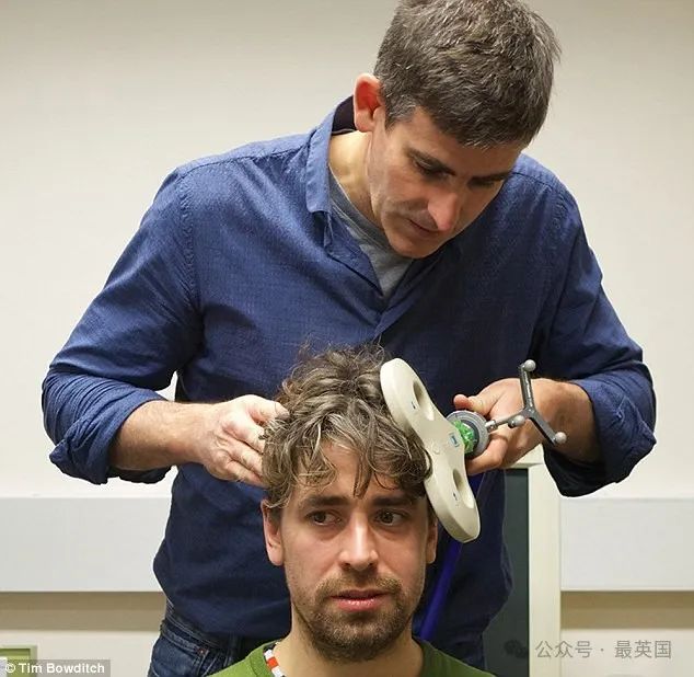 Thomas Thwaites is pictured being fitted for the special helmet he wore to disguise himself as a goat