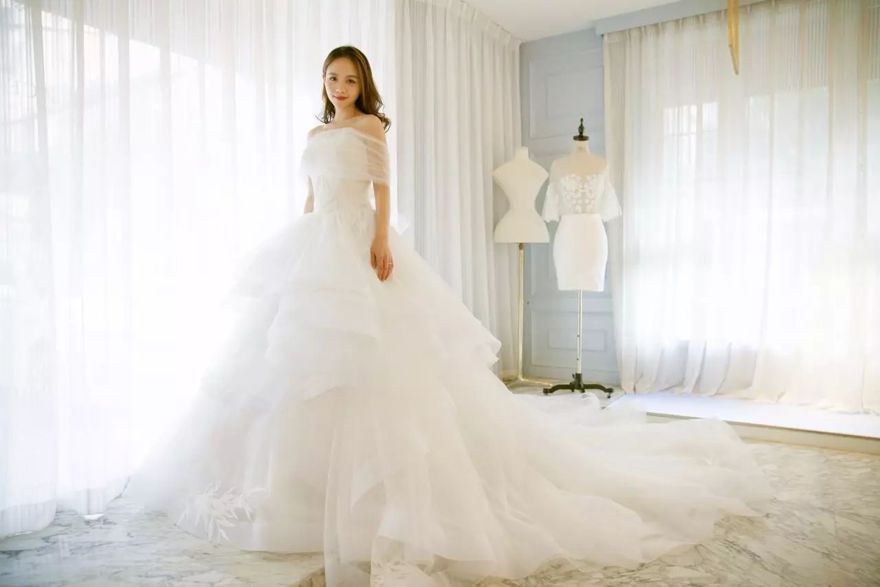 by婚纱设计师wenny