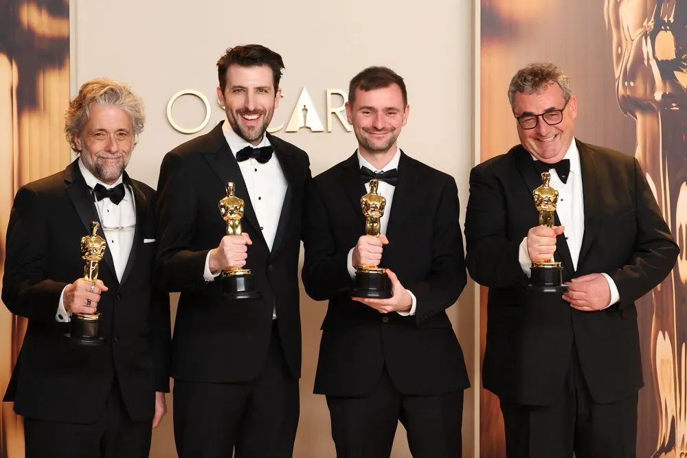 Paul Lambert, Stephen James, Rhys Salcombe, Gerd Nefzer at the 97th Oscars held at the Dolby Theatre on March 2, 2025 in Hollywood, California.