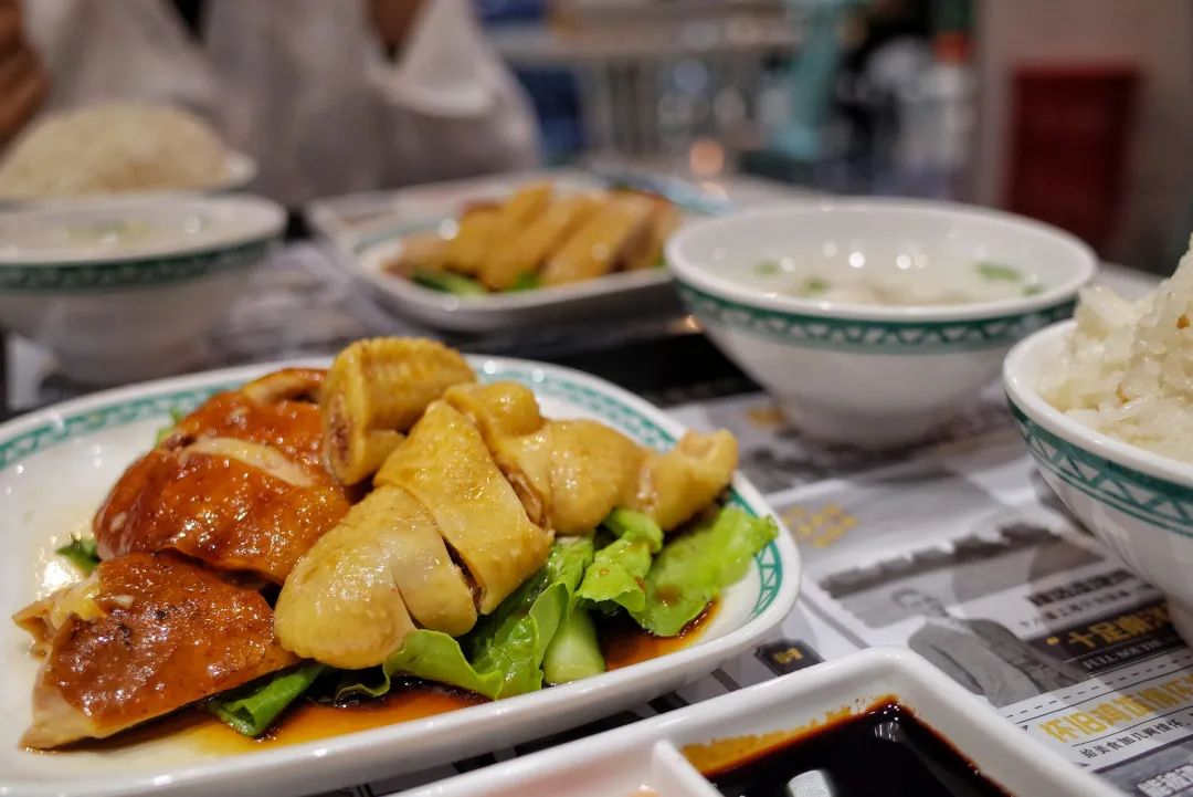 selective focus photography of plate of food on table