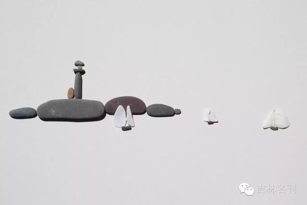 用小石子摆出萌萌哒世界