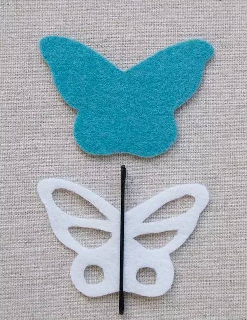 制作步骤 1.将蝴蝶模型摆放在不织布上,画出形状并剪裁.