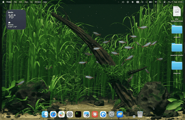 Deskworlds 官方演示：桌面上的河床鱼群