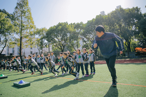 操场上的学校丨宝山区江湾中心校：“兴趣化”，让小学生爱上体育相关资料 11