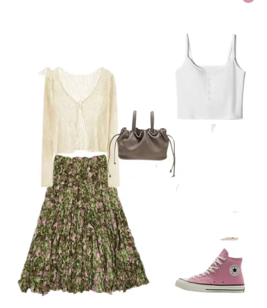 其中最显清新甜美风的穿搭莫过于用针织衫搭配五颜六色的碎花裙,比如