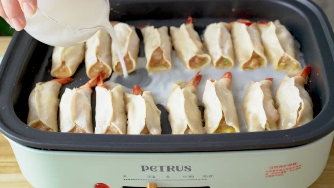 锅贴和煎饺的区别_锅贴和煎饺哪个更好吃_锅贴的饺子是生煎还是煮好煎