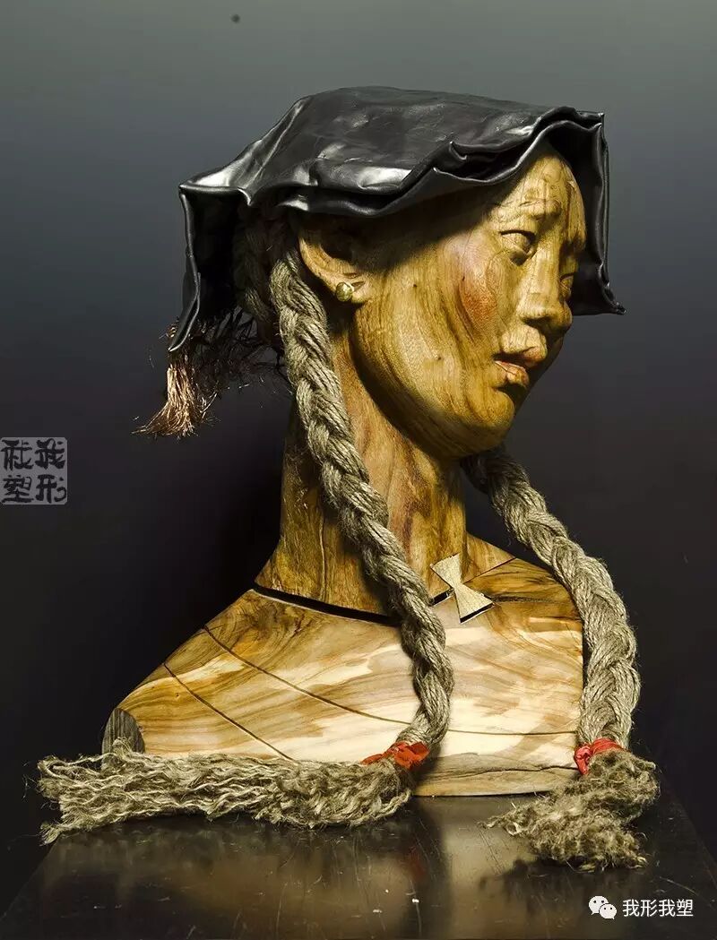 著名木雕艺术家李万秋