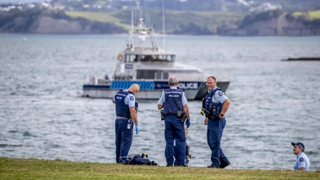 Police officers at Gulf Harbour after Shulai Wang’s body was discovered.