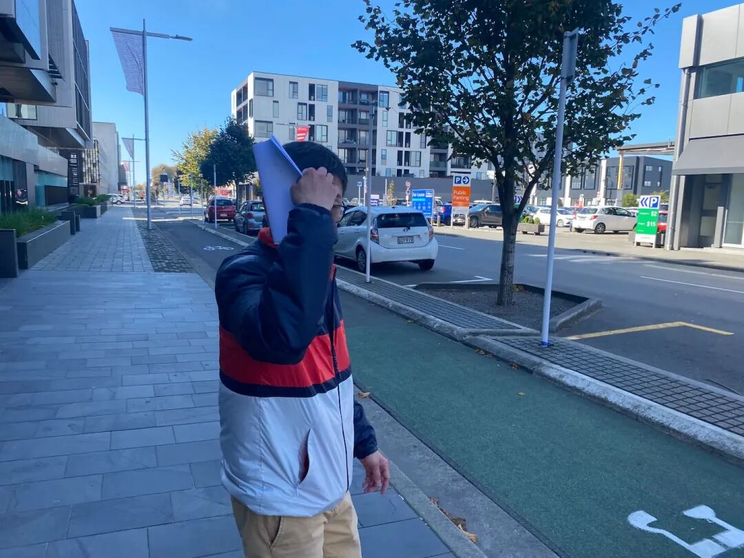 Rongjian Feng outside the Christchurch District Court where he was sentenced for wilful ill-treatment of an animal. Photo / Al Williams