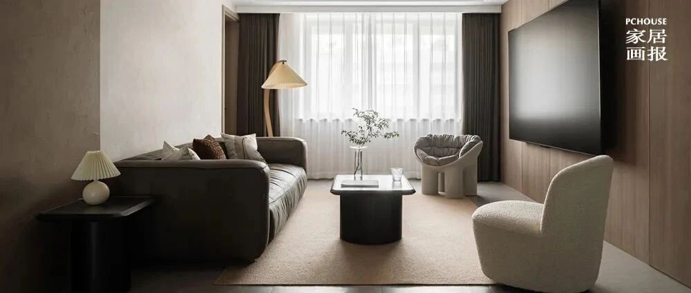 奶咖与木色的温润形成的118㎡侘寂，形成一家人的通透空间