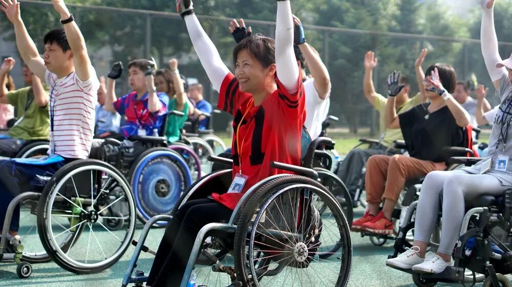 翻开100位残疾人的相册总有一张舍不得删