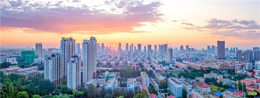 朝霞映新城晨雾璀璨新城大乐林寺航拍通辽建设中的新通辽通辽开发区