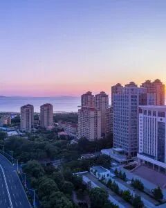 威海火炬八街戴斯温德姆酒店（国际海水浴场店）·栖海高级观影房-全屋暖气|巨幕投影|日出日落美景 1晚