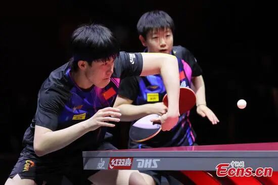 Wang Chuqin/Sun Yingsha (R) compete during the mixed doubles final at ITTF World Table Tennis Championships Finals Doha 2025 in Qatar, May 24, 2025. (Photo/VCG)