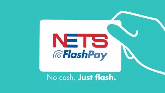 你可以使用带有nets flashpay标志的卡片
