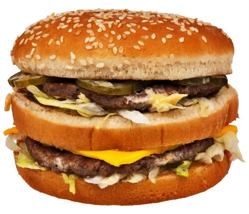 sauce, lettuce, cheese, pickles, onions on a sesame seed bun