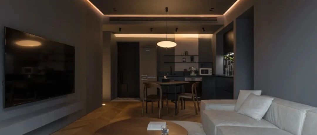 89㎡简约风，暖色灯光丰富深灰空间，圆形元素增加变化！