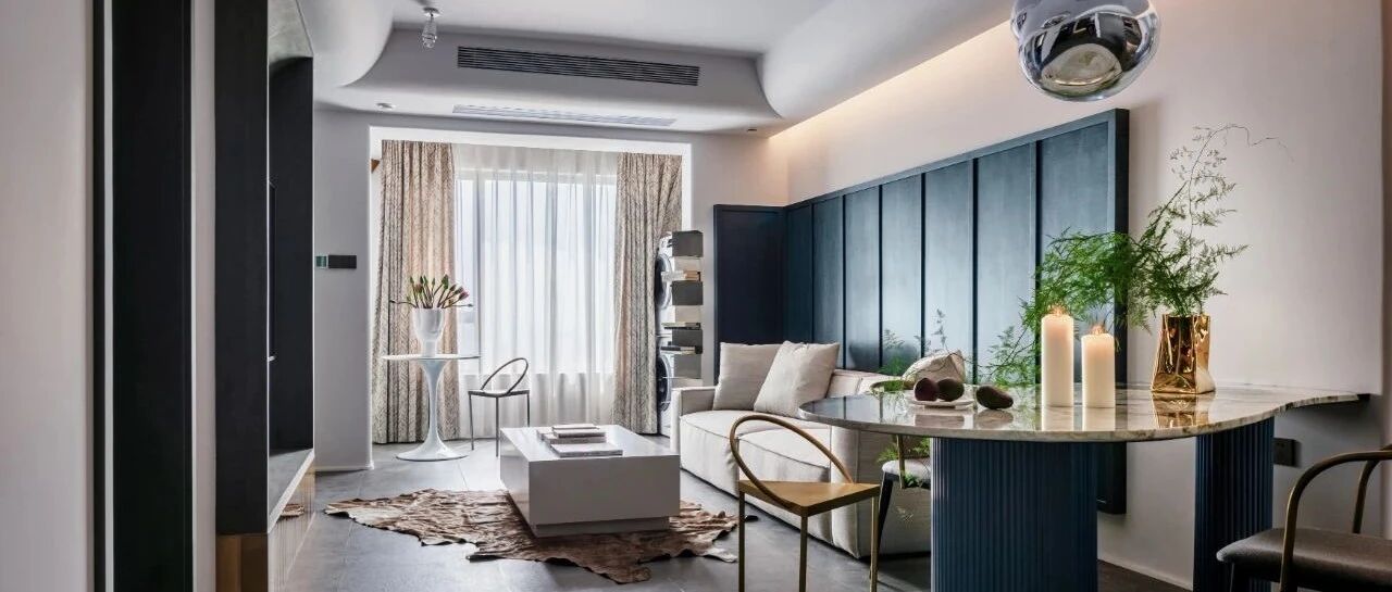 89㎡现代风格，深蓝色墙板、弧形大理石餐桌...理性克制的质感空间！