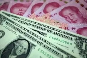 1英镑等于多少人民币 目前1美元等于7.1603人民币，假如一个月前将200万元兑换成美元呢？