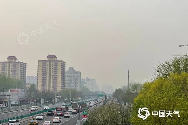 大风沙尘齐至北京今天最高温27,明天气温骤降