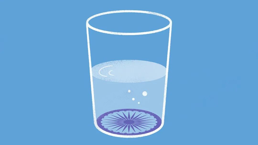 Illustration of a glass half full of water with the Ashoka Chakra wheel from the Indian flag at the bottom.