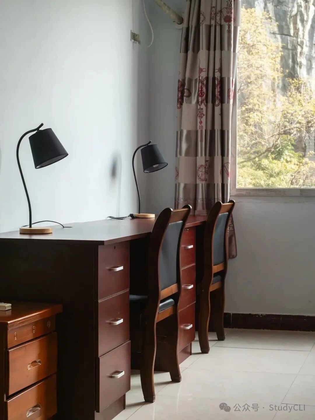 Student bedroom at the CLI Center with new door and modern finishes