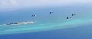 解放军战机现身南海画面罕见密集公开，歼-15首次曝光飞越永兴岛机场