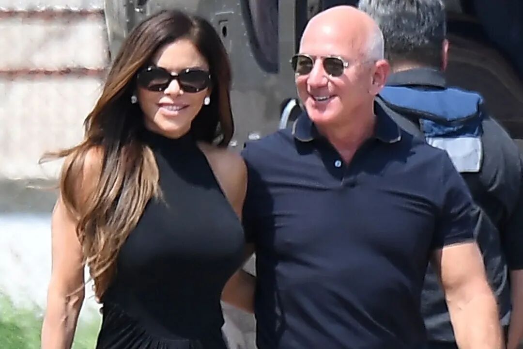 Jeff Bezos and Lauren Sanchez are all smiles as they arrive in Venice ahead