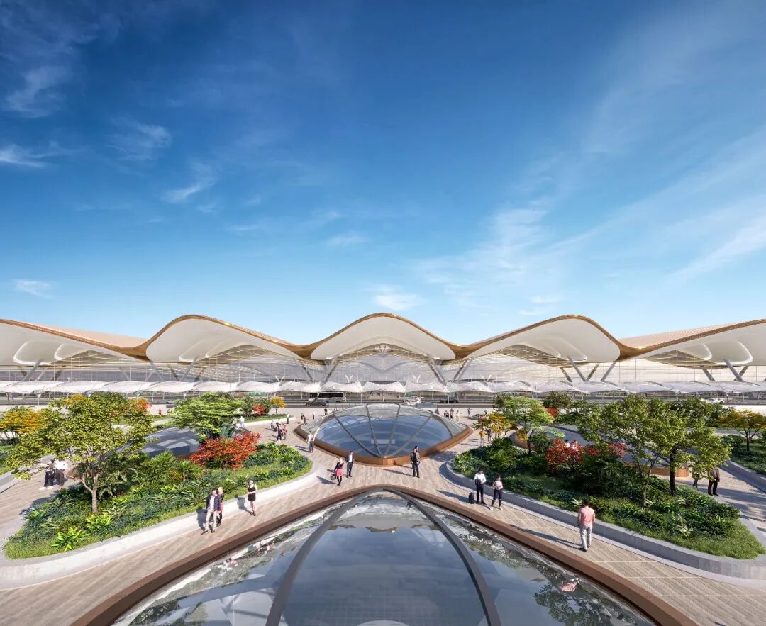 新机场主楼采用交叉拱屋面，波浪形檐口及通透幕墙构成大气舒展的主立面形象。