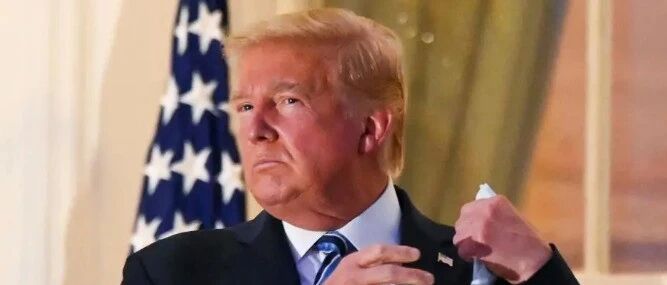 特朗普返回白宫当众摘口罩 还不忘发视频宣传