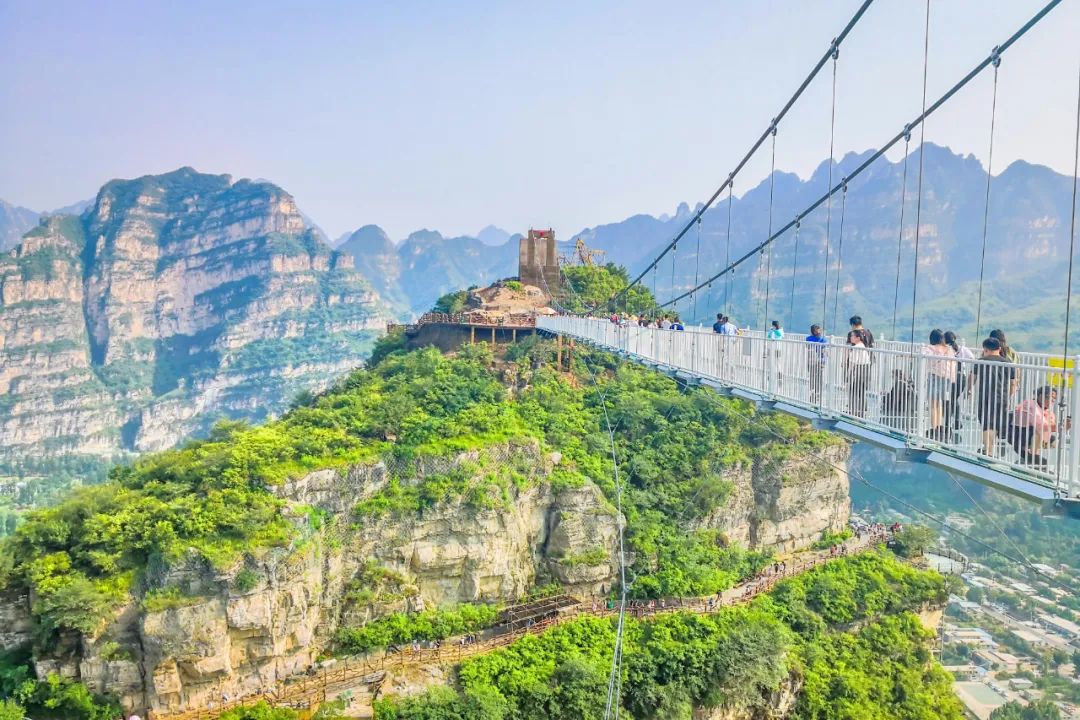 仙西山612021桃花节|仙西山水洞寨/穿雨林谷/民族表演/可以坐着飞天