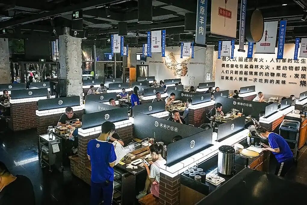 A Chinese barbecue chain has issued refunds totalling over US$162,000 yuan to 48,000 tables after acknowledging that their skewers had not been properly cooked. Photo: Sohu