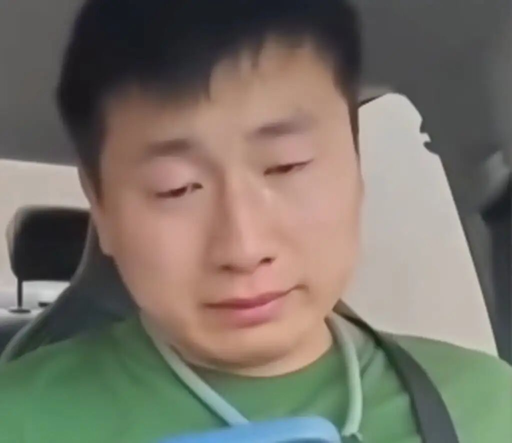 Guo, above, photographed in tears over the killing of his beloved pet. Photo: Douyin