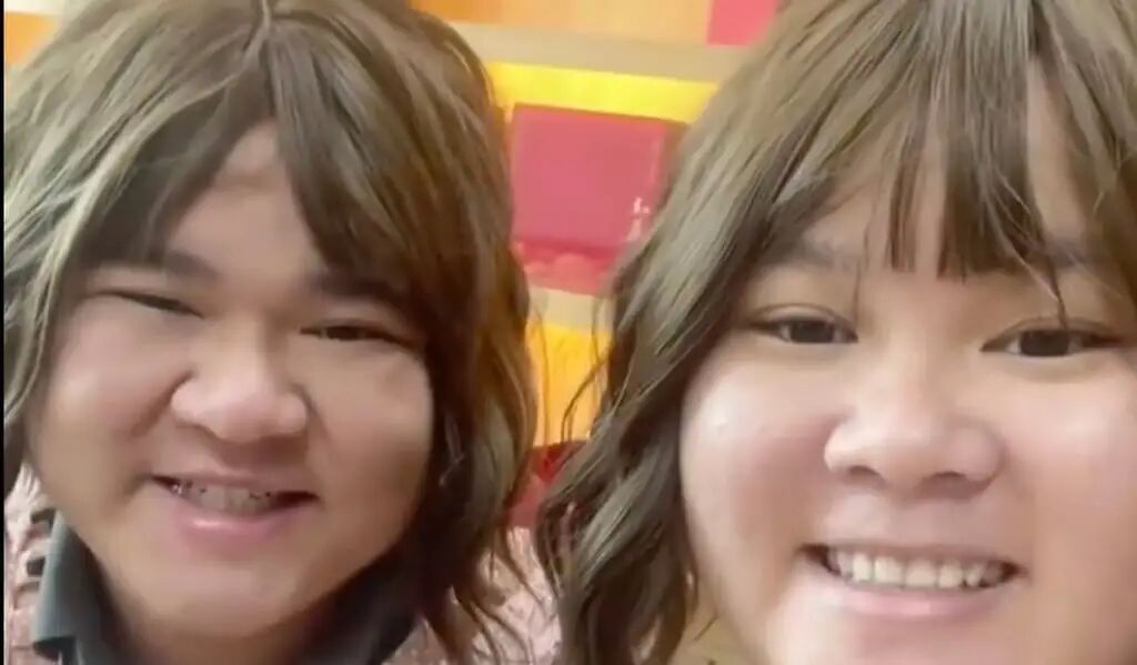 The introverted husband initially found it challenging to dress in women's clothing for promotional videos, but he eventually embraced it after witnessing his wife's commitment to growing their business. Photo: Handout