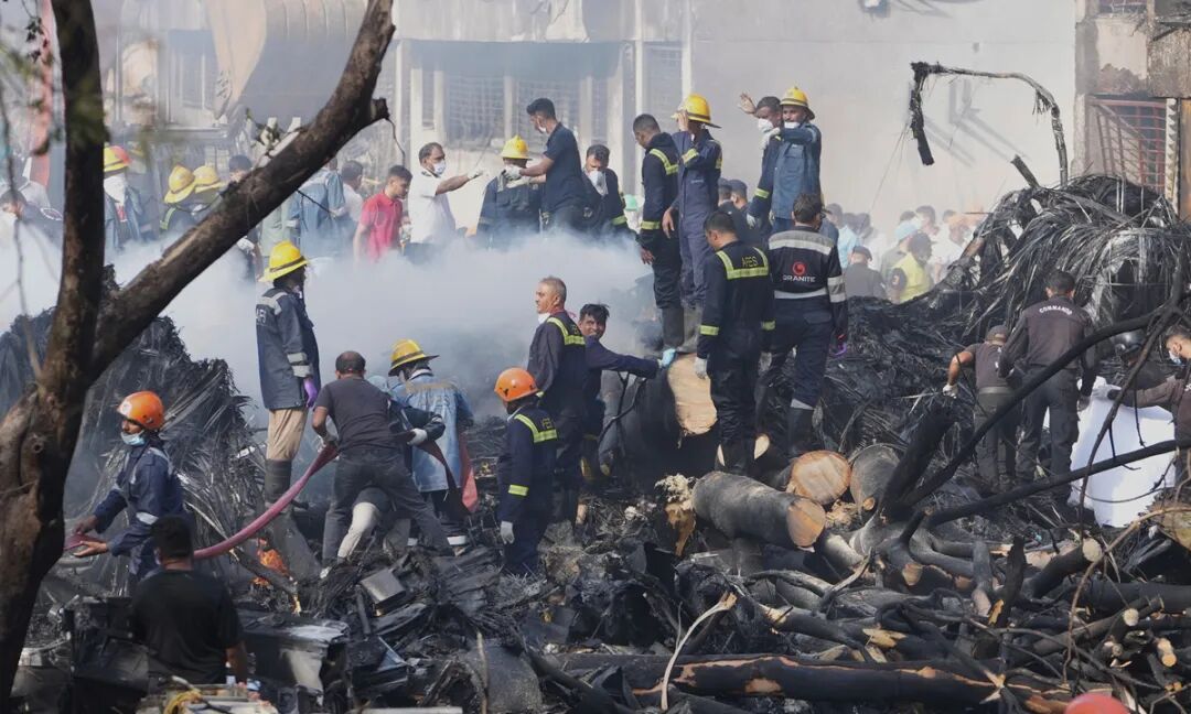 Search and rescue teams respond to the scene of a plane crash in Ahmedabad, India, Thursday, June 12, 2025. Photo: AFP