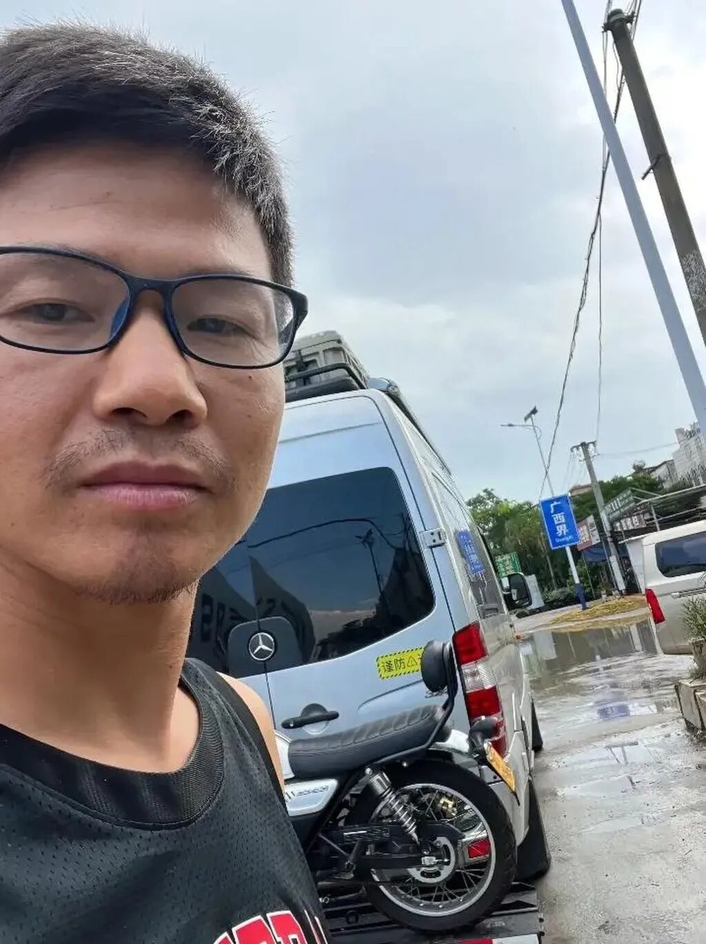 Camper van owner Guo pictured alongside his 