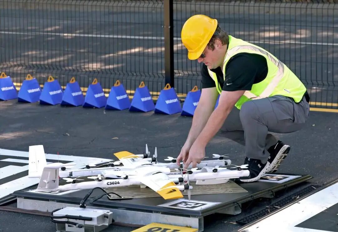 Jourdan Hill, Wing Flight Ops Coordinator for Charlotte readies a drone for flight at the Nest (Drone Hub) at the Walmart Supercenter on Galleria Blvd. in Charlotte, NC.