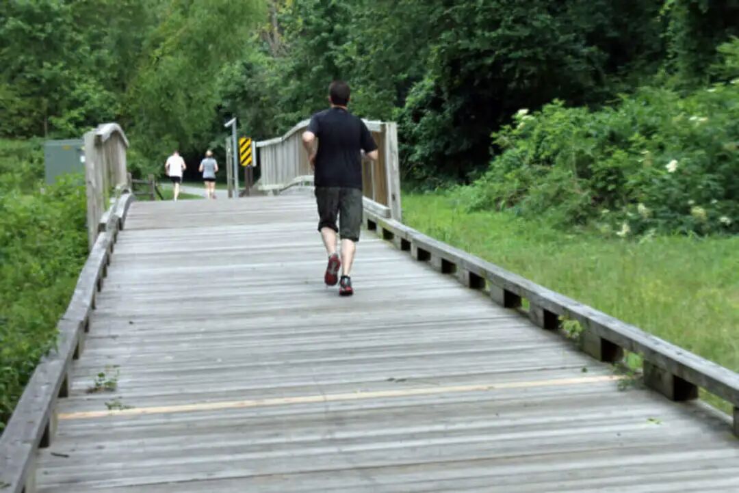Joggers use the Beaver Creek Greenway in Apex, which was named a top small city.