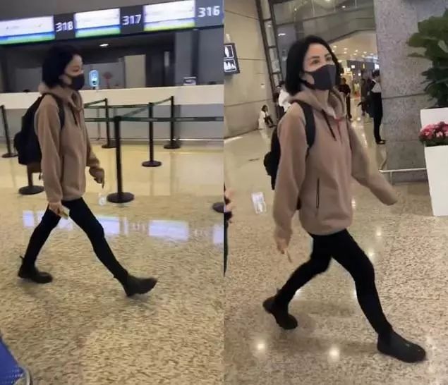 王菲懶理分手傳聞，50歲的她穿駝色衛衣走機場，皮膚緊致狀態好 時尚 第3張