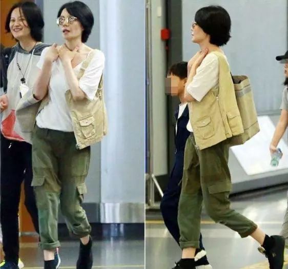 王菲懶理分手傳聞，50歲的她穿駝色衛衣走機場，皮膚緊致狀態好 時尚 第5張