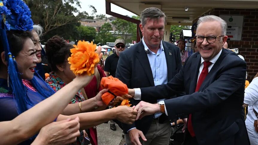 Anthony Albanese shakes hands at Lunar New Year celebrations in Sydney