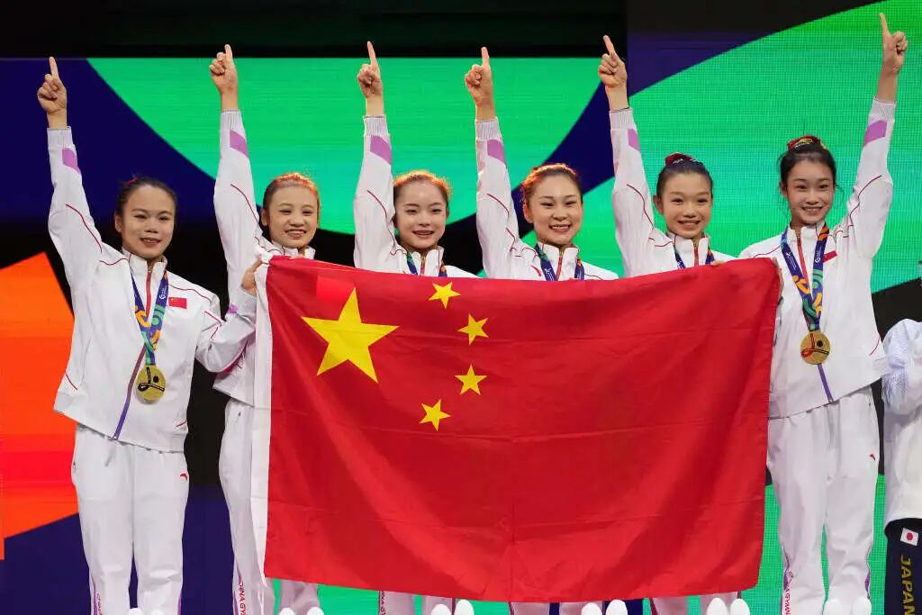 中国体操女队敢拼才会赢！世锦赛夺金背后，是坚持与热爱