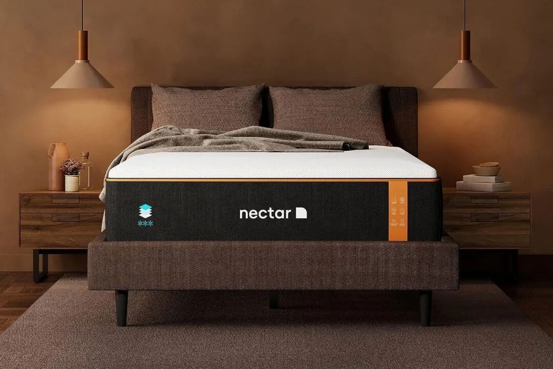 The Nectar Premier Copper Mattress in a brown room.